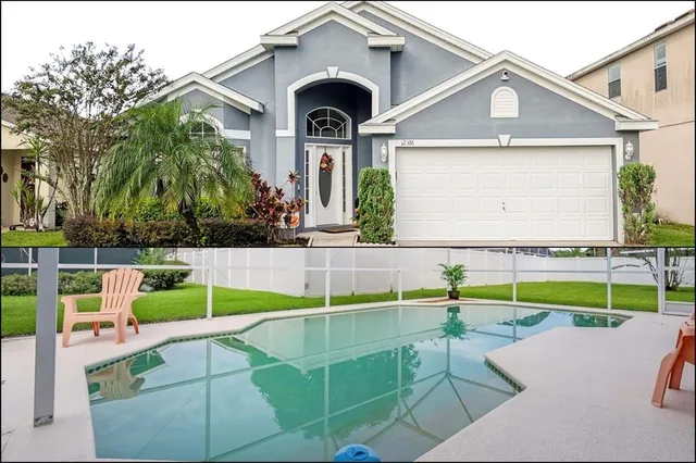 a view of a house with a swimming pool