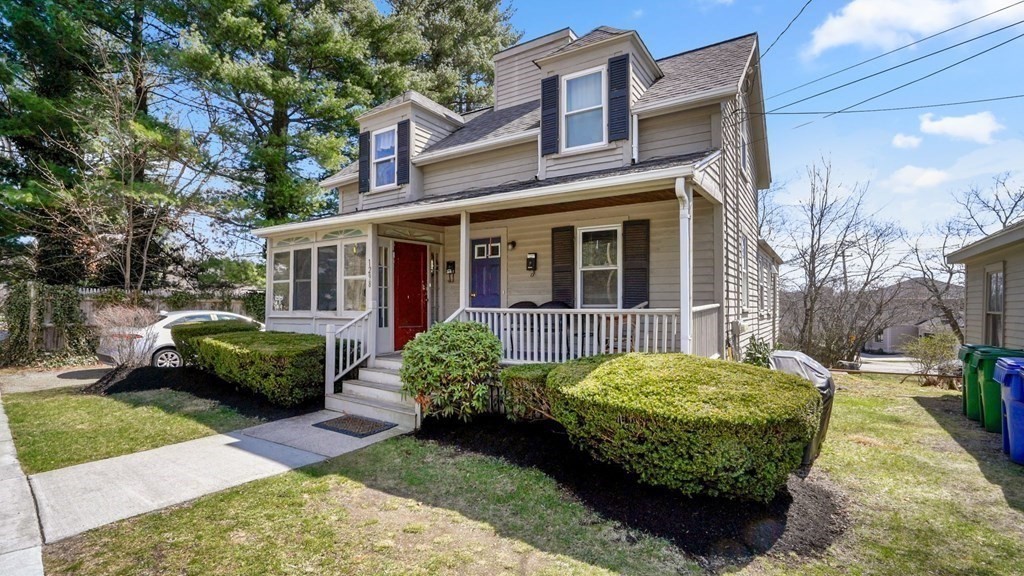 1298 Commonwealth Avenue Newton, MA 02468 - Photo 1 of 28 a front view of a house with a garden