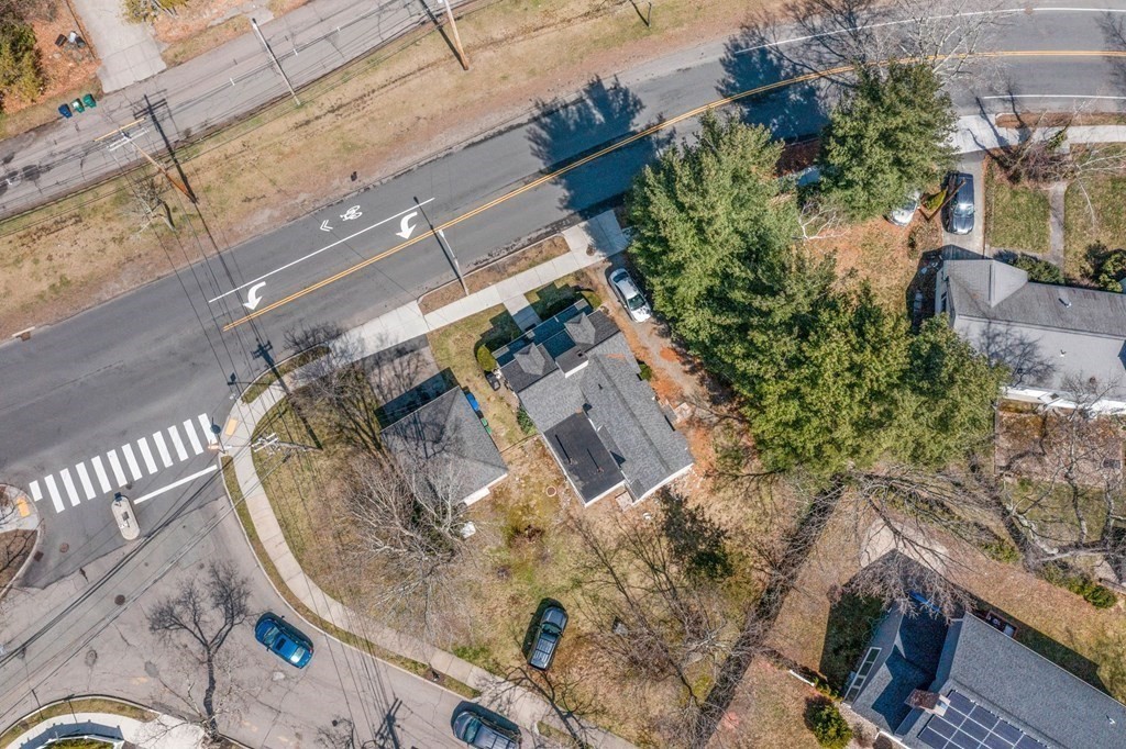 1298 Commonwealth Avenue Newton, MA 02468 - Photo 25 of 28 an aerial view of a house with a yard