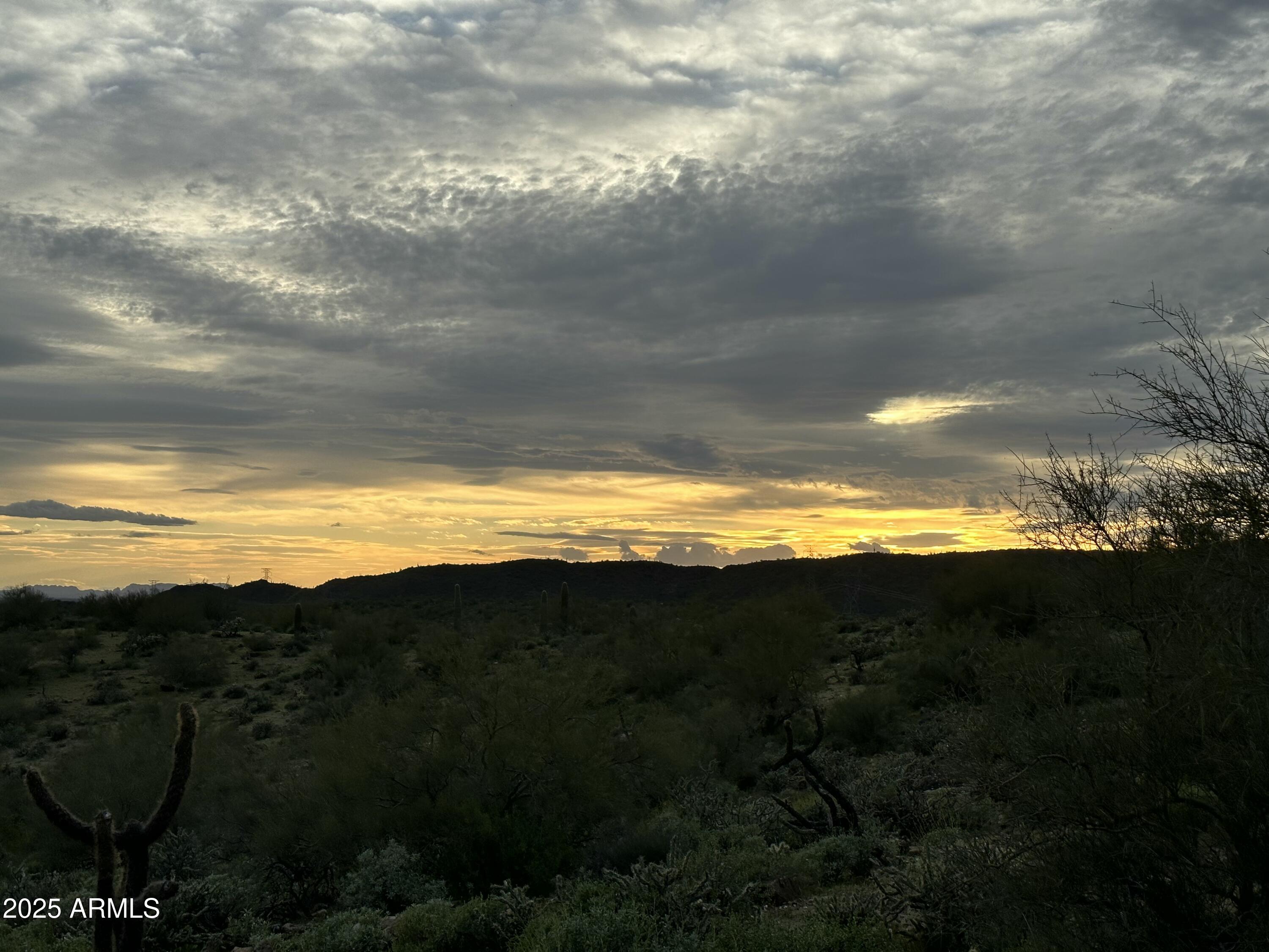 a view of an ocean and mountain