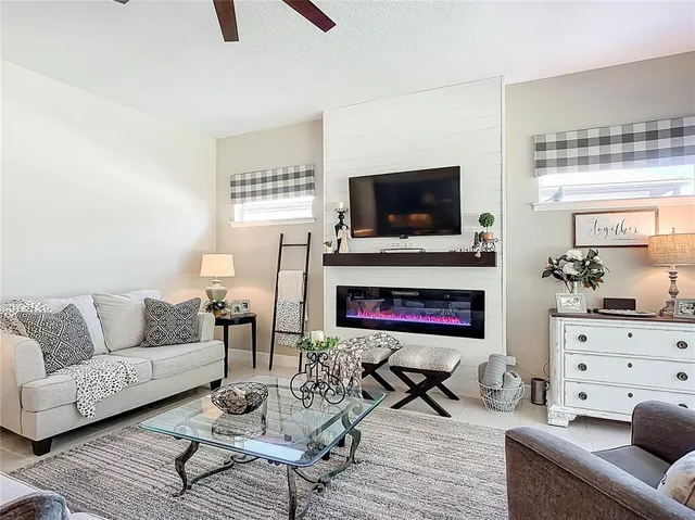 a living room with furniture or couches and a coffee table