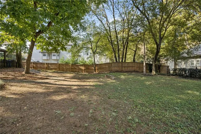 a view of a house with a big yard