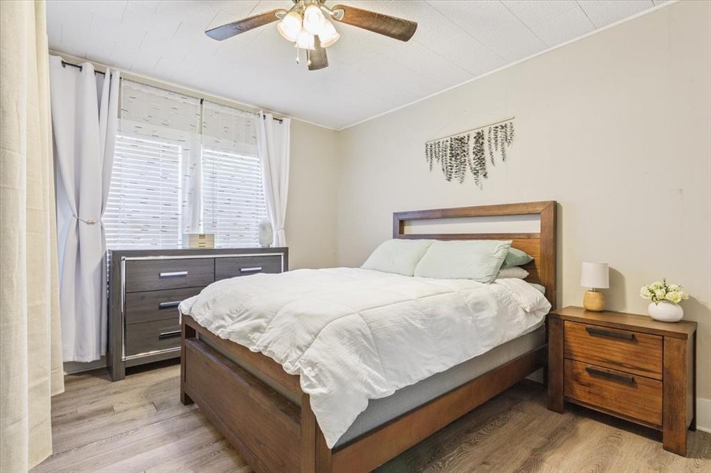 102 Brookshire Street Riesel, TX 76682 - Photo 14 of 24 a bedroom with a bed and a window