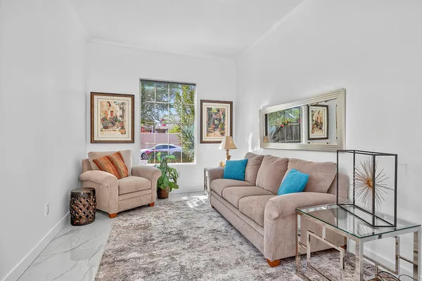 a bathroom with a double vanity sink mirror and shower