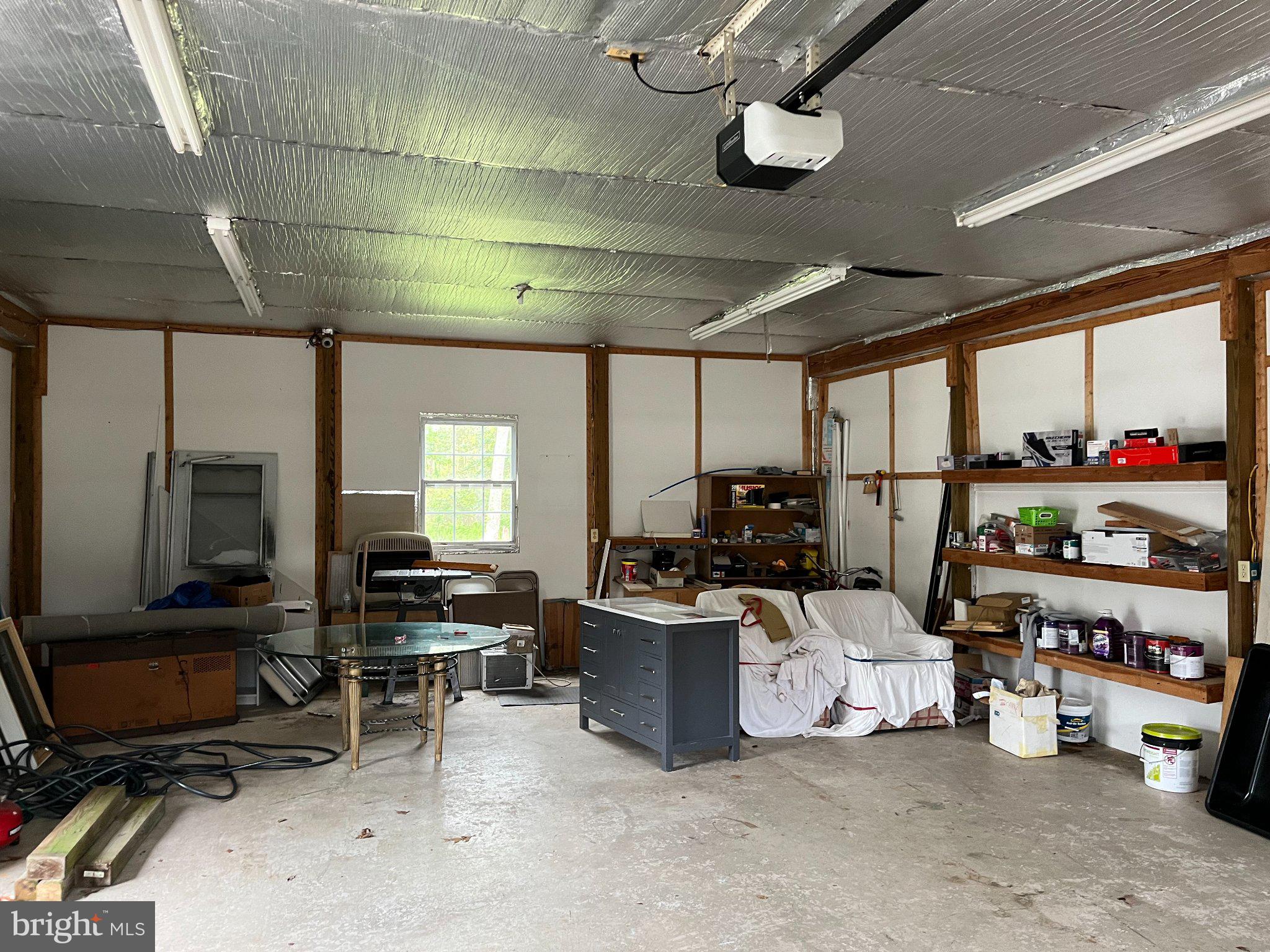 112 1st Avenue Tuckerton, NJ 08087 - Photo 14 of 42 Spacious workshop with ample storage.
