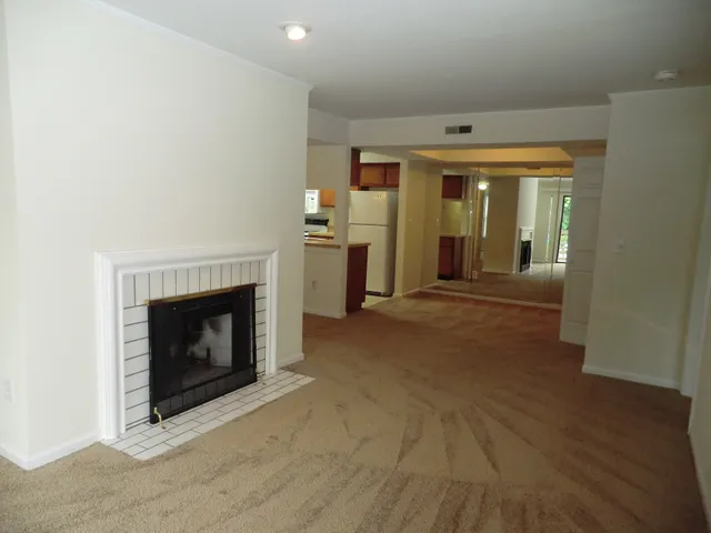 a view of a livingroom with a fireplace