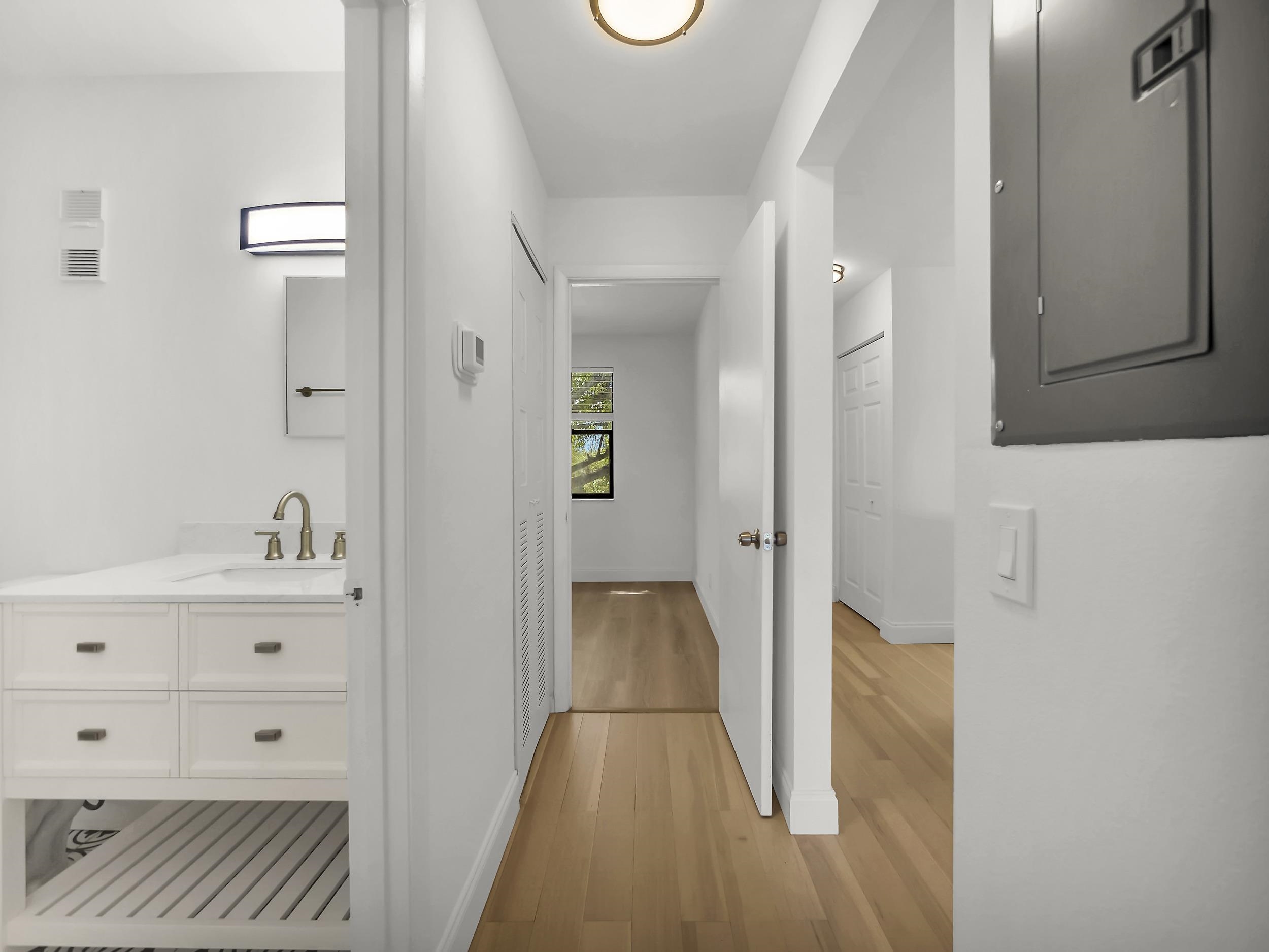 650 West Pope Road, Unit 218 St. Augustine, FL 32080 - Photo 16 of 30 a view of hallway with wooden floor