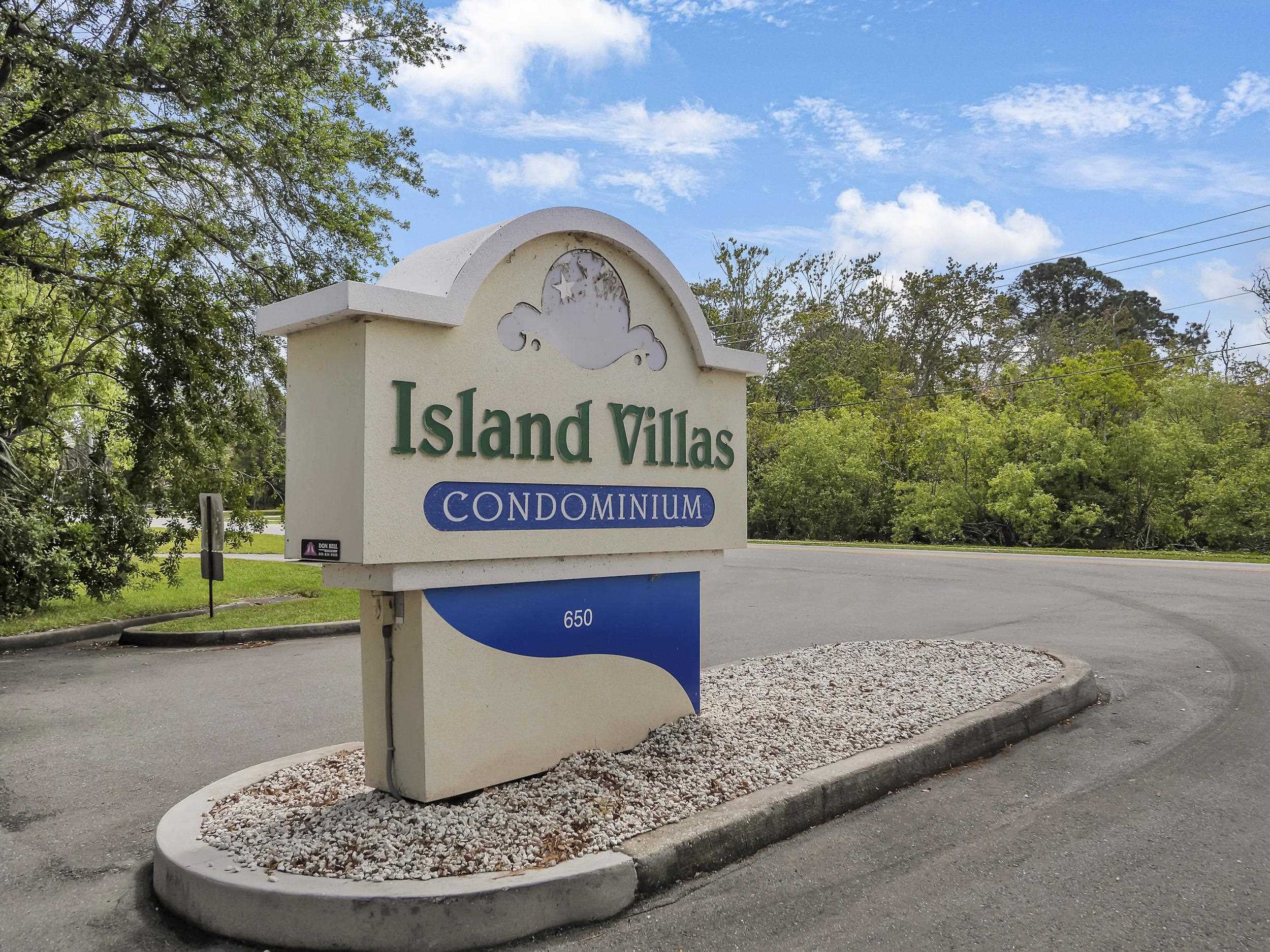 650 West Pope Road, Unit 218 St. Augustine, FL 32080 - Photo 28 of 30 a sign on the side of a street