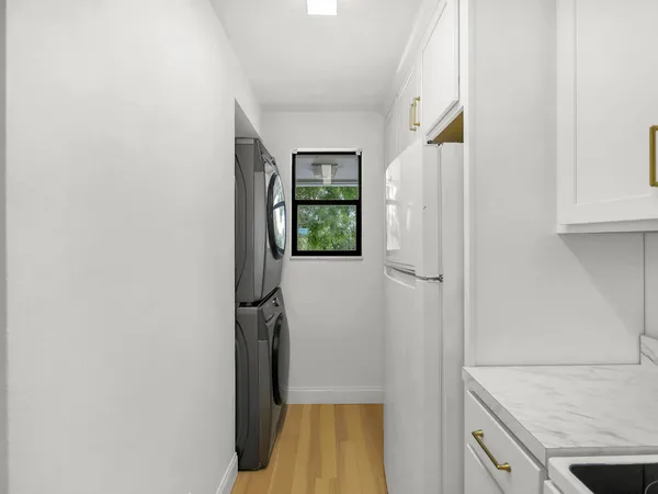 a view of walk in closet with window
