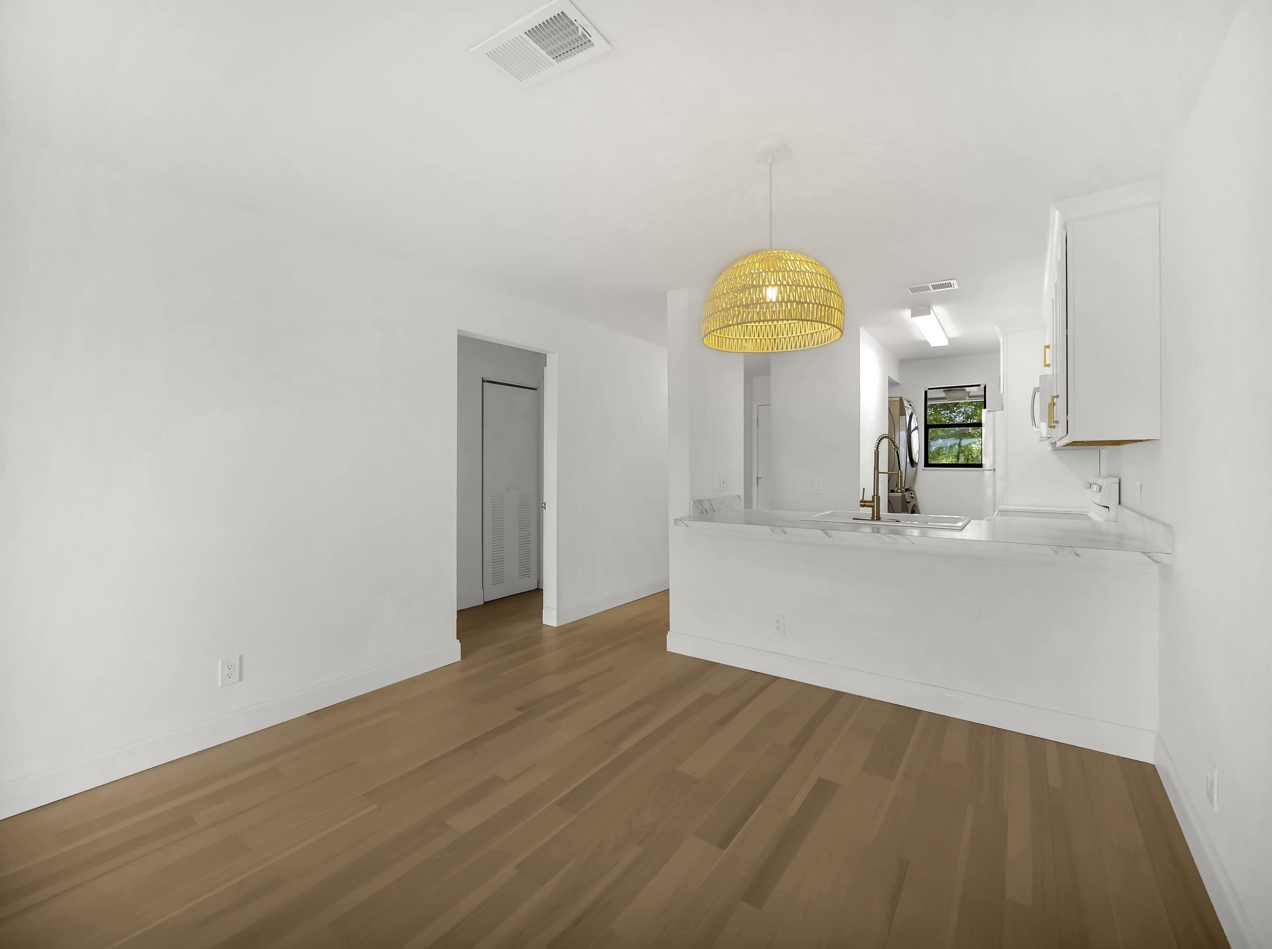 650 West Pope Road, Unit 218 St. Augustine, FL 32080 - Photo 10 of 30 a view of a kitchen with a sink and a window