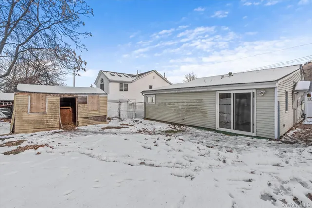 a picture of a very nice looking living room with a large mirror