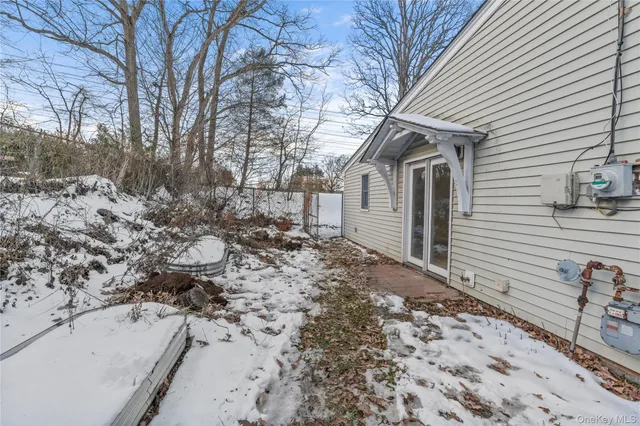 a view of snow on the side of road