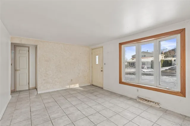 a view of an empty room with window