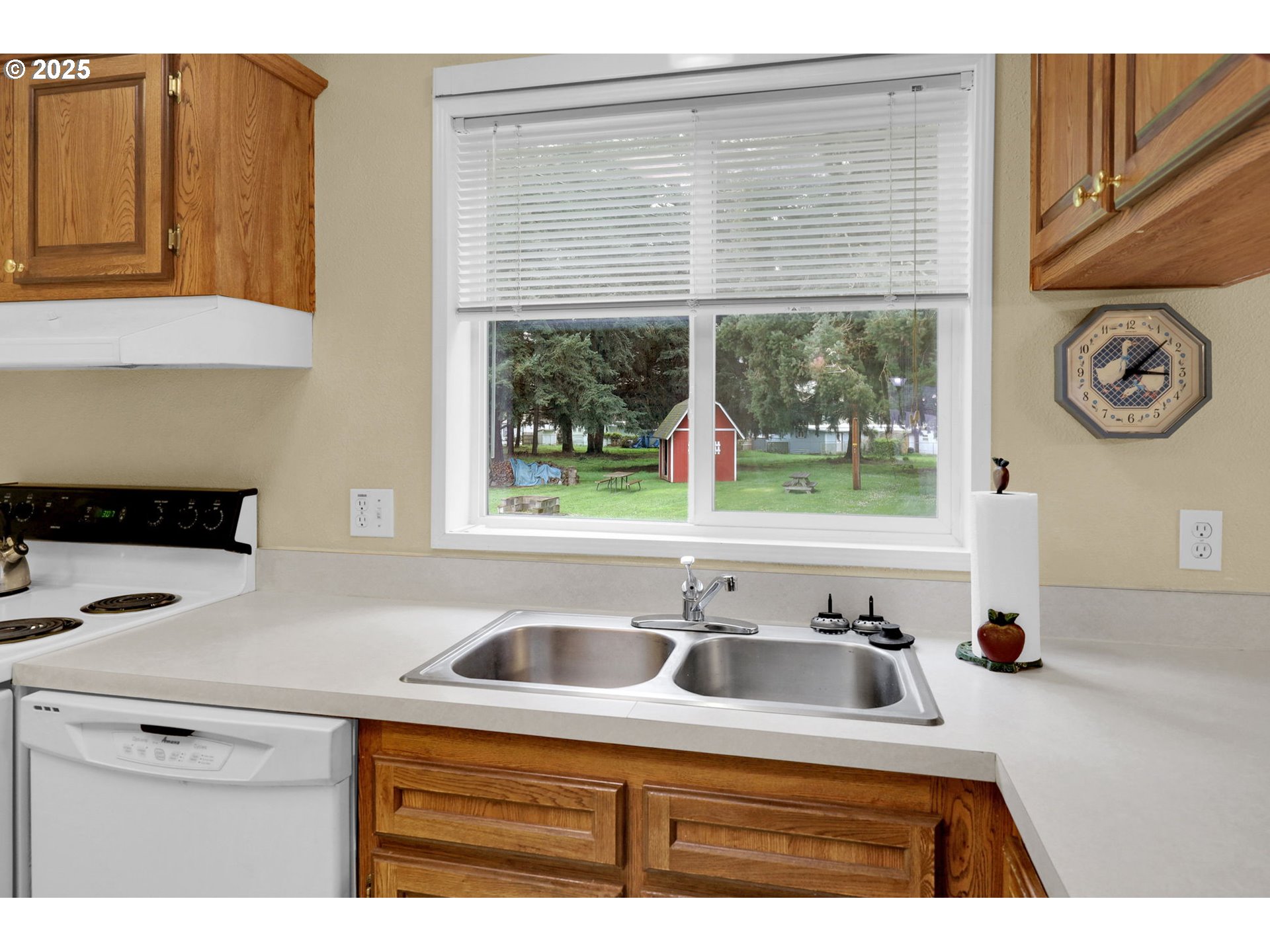 3900 Coburg Road, Unit 95 Eugene, OR 97408 - Photo 5 of 42 a kitchen with a sink and a window
