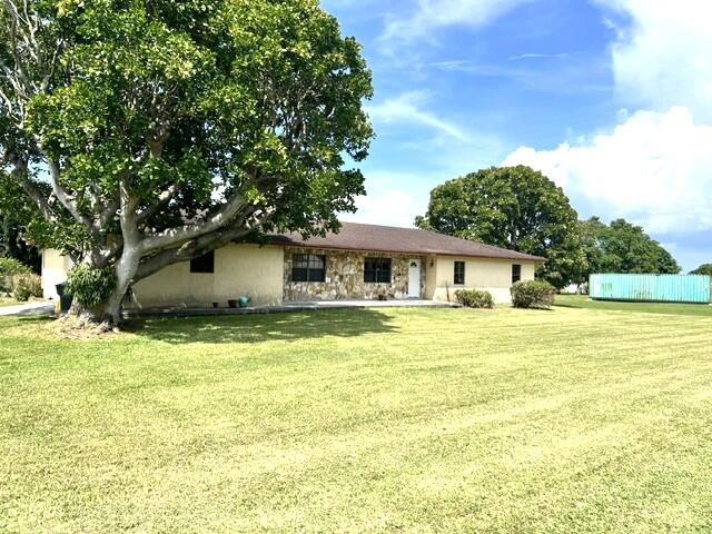 36911 3rd Street Canal Point, FL 33438 - Photo 10 of 19 Exterior Front
