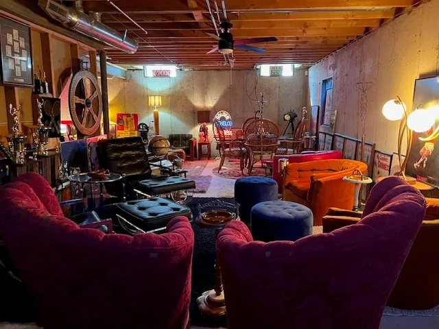 a room with lots of furniture and flower