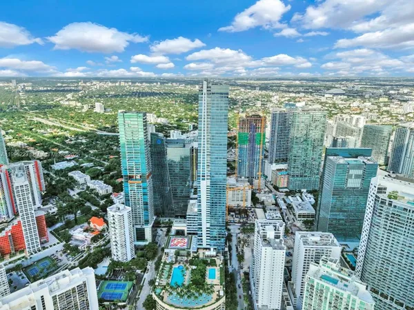 a view of a city with tall buildings