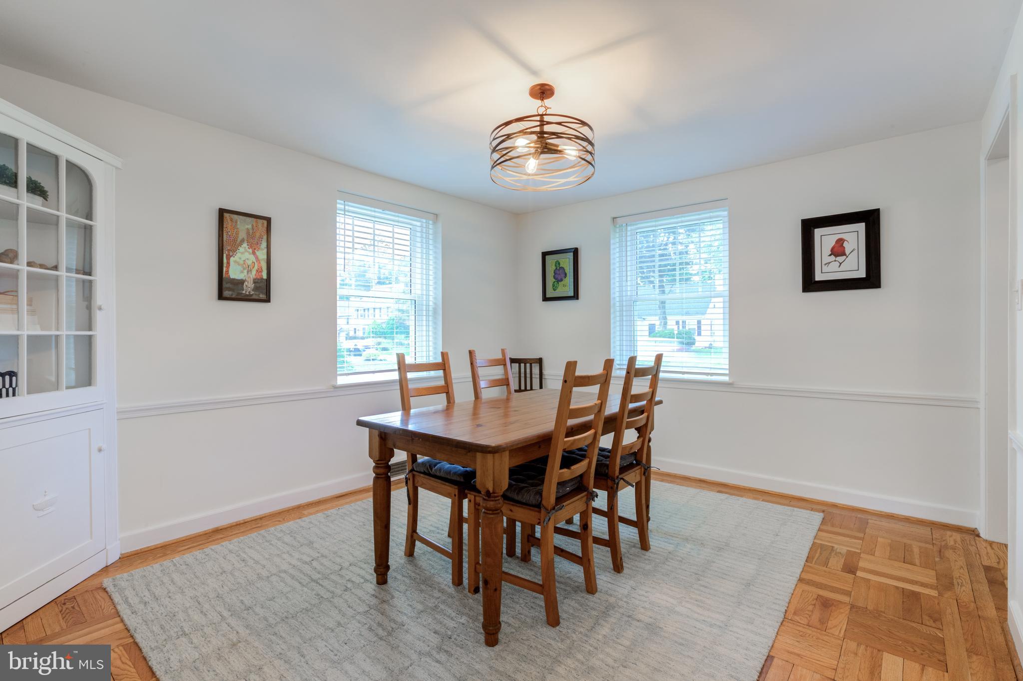 51 Mansion Road Springfield, PA 19064 - Photo 15 of 45 a view of a dining room with furniture and wooden floor