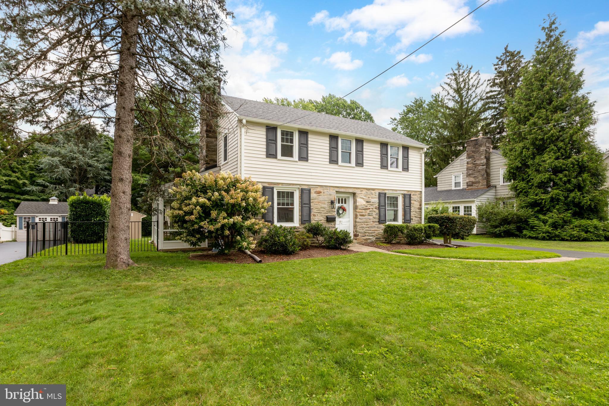 51 Mansion Road Springfield, PA 19064 - Photo 2 of 45 a front view of a house with garden