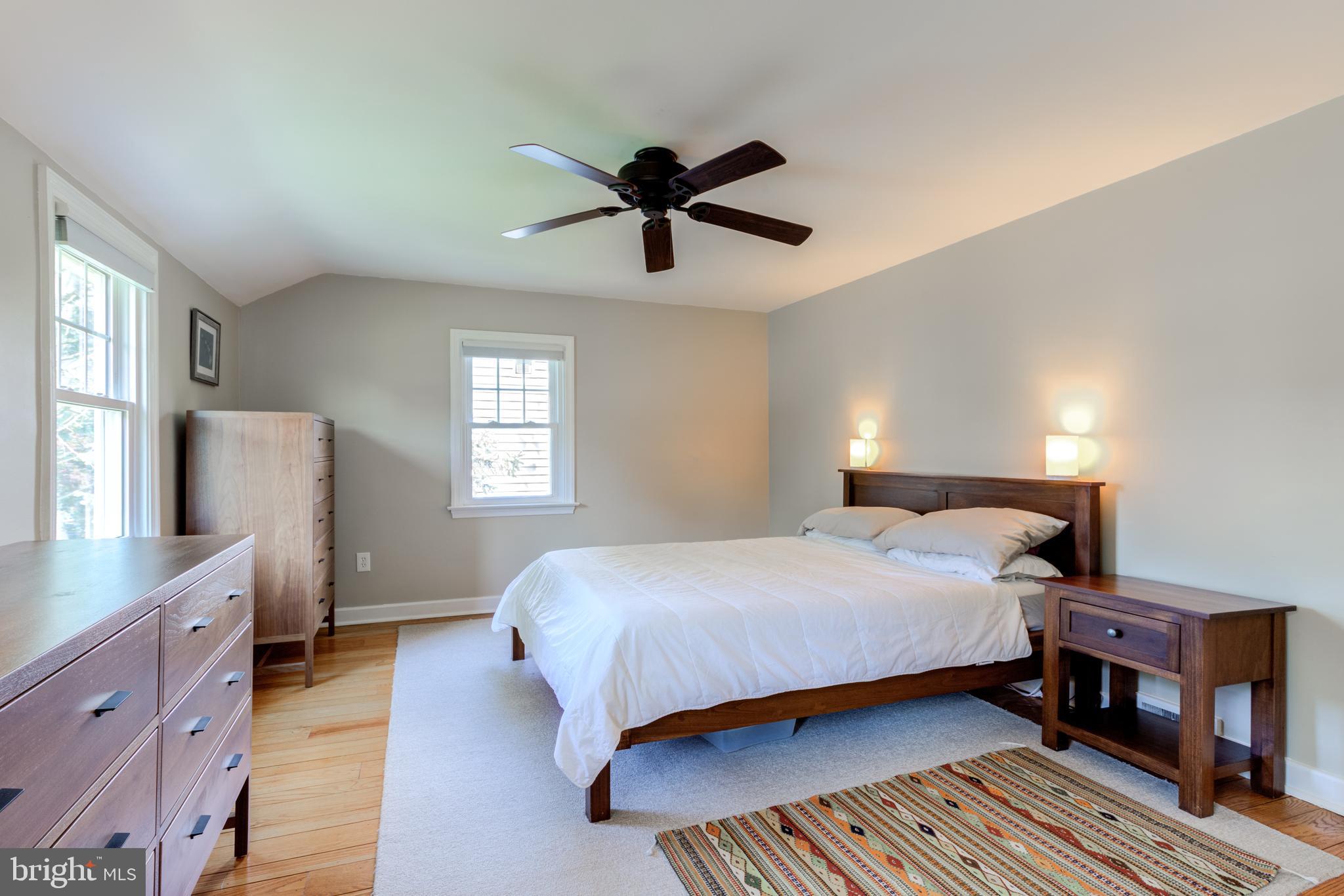 51 Mansion Road Springfield, PA 19064 - Photo 25 of 45 a bedroom with a bed and wooden floor