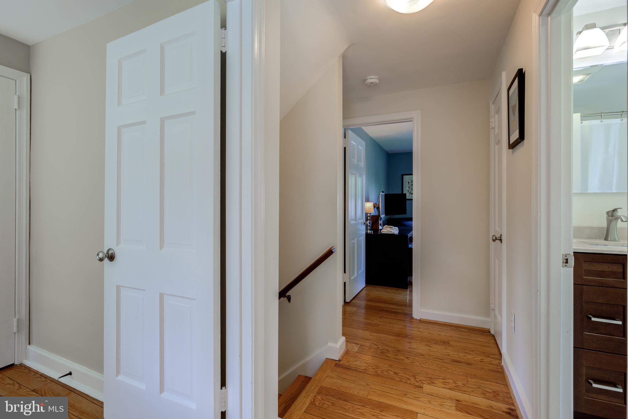 51 Mansion Road Springfield, PA 19064 - Photo 29 of 45 a view of a hallway with wooden floor and closet