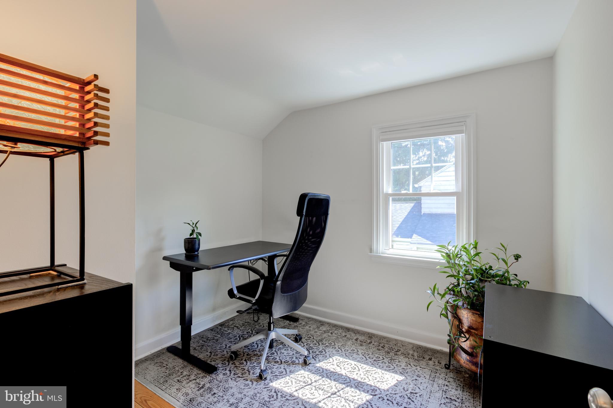 51 Mansion Road Springfield, PA 19064 - Photo 33 of 45 a view of a workspace with furniture and a potted plant