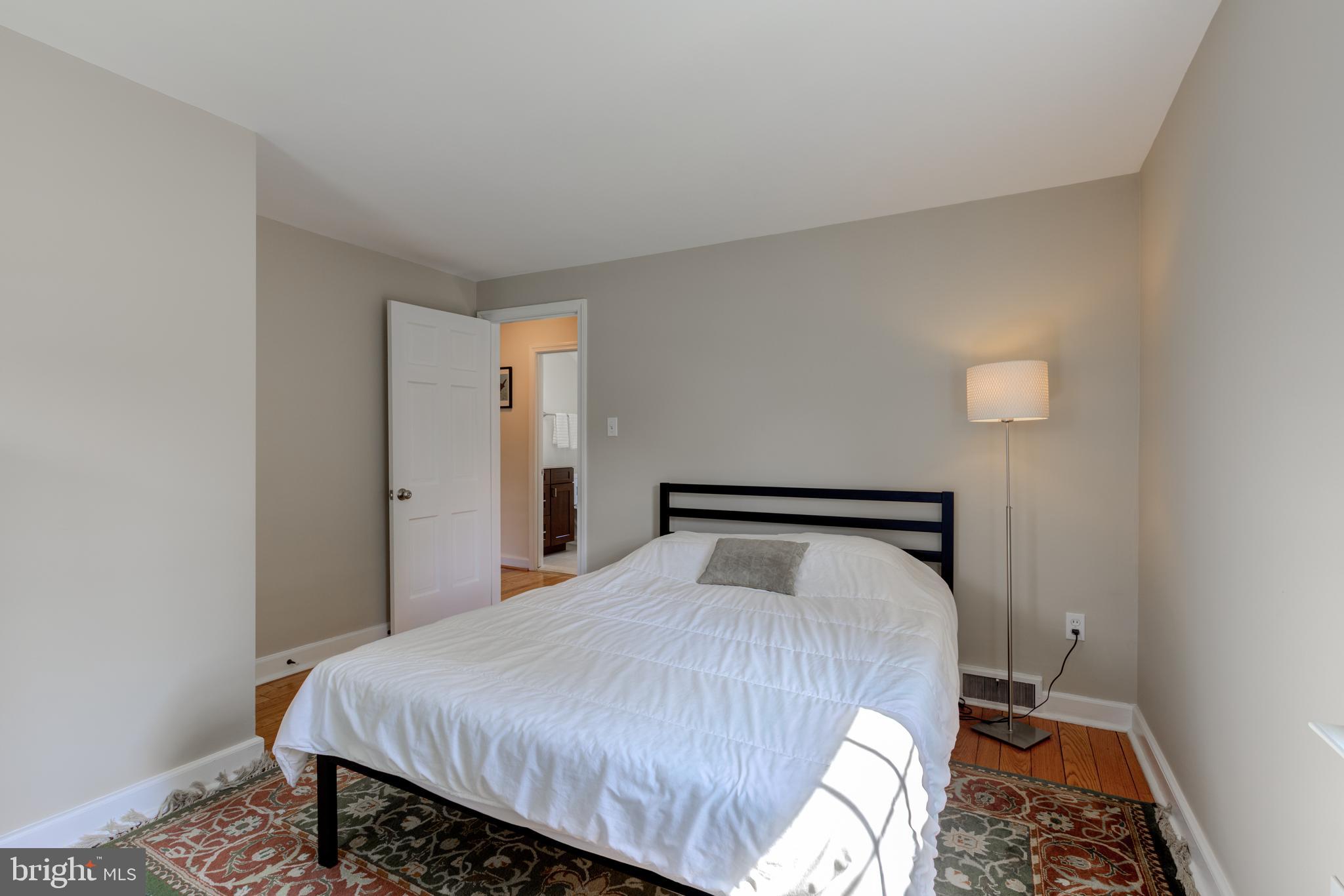 51 Mansion Road Springfield, PA 19064 - Photo 34 of 45 a bedroom with a bed and a window