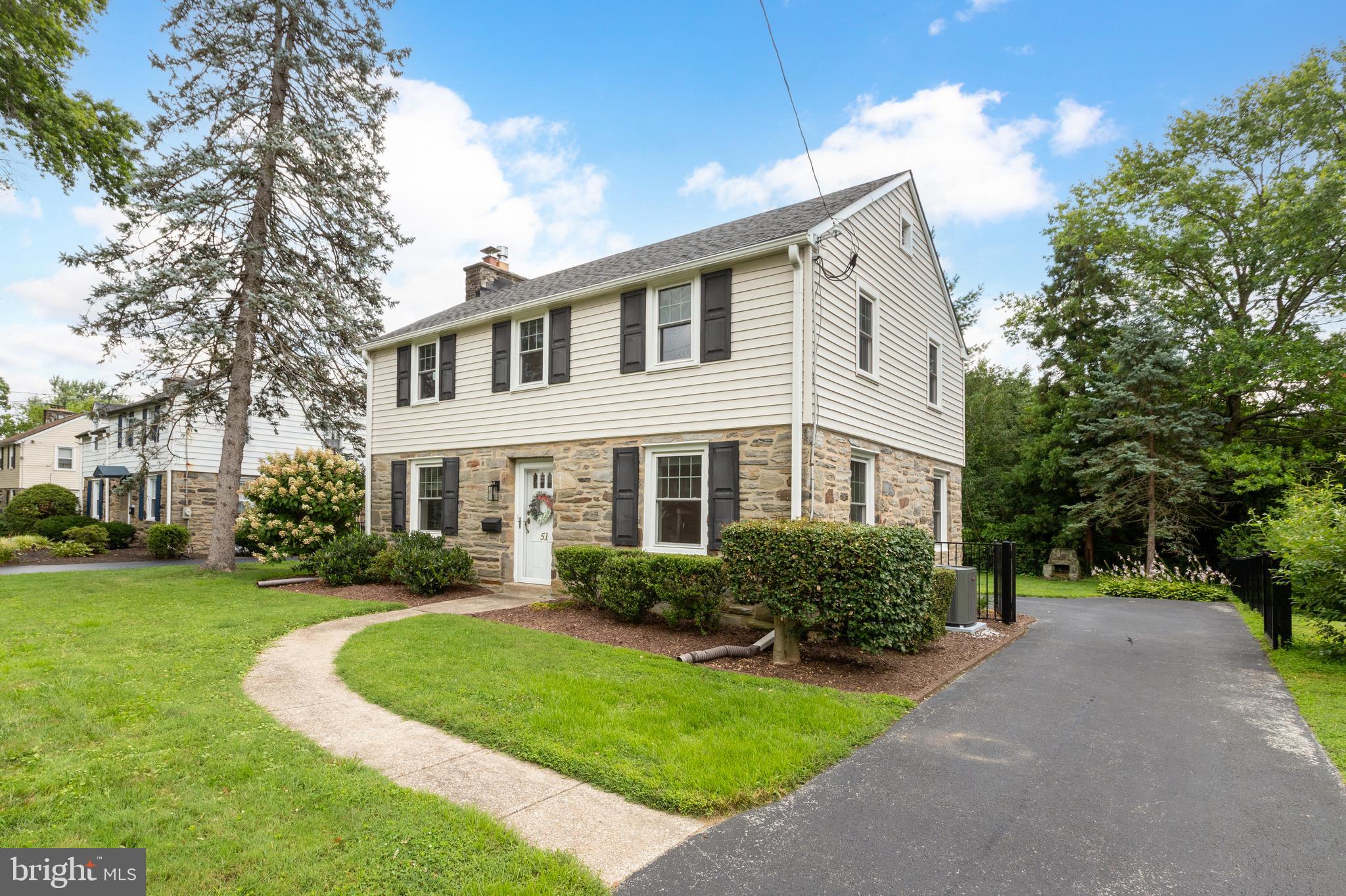 51 Mansion Road Springfield, PA 19064 - Photo 4 of 45 a front view of a house with a yard