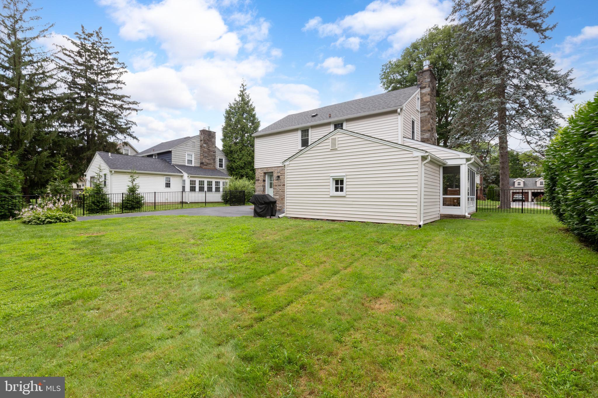 51 Mansion Road Springfield, PA 19064 - Photo 42 of 45 a view of a house with a yard