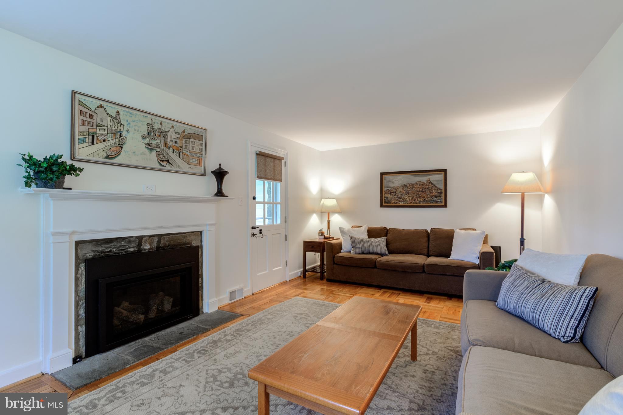 51 Mansion Road Springfield, PA 19064 - Photo 6 of 45 a living room with furniture and a fireplace