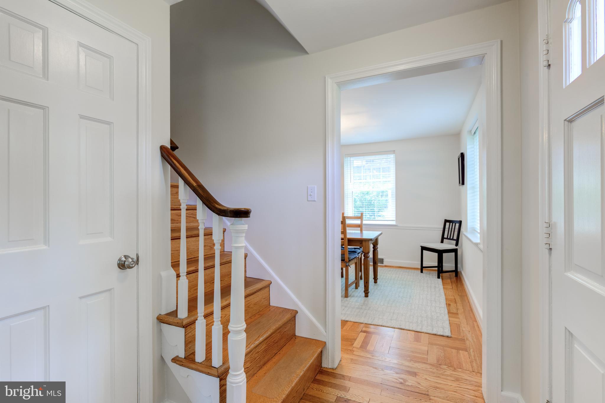 51 Mansion Road Springfield, PA 19064 - Photo 9 of 45 a view of entryway and dining room with wooden floor
