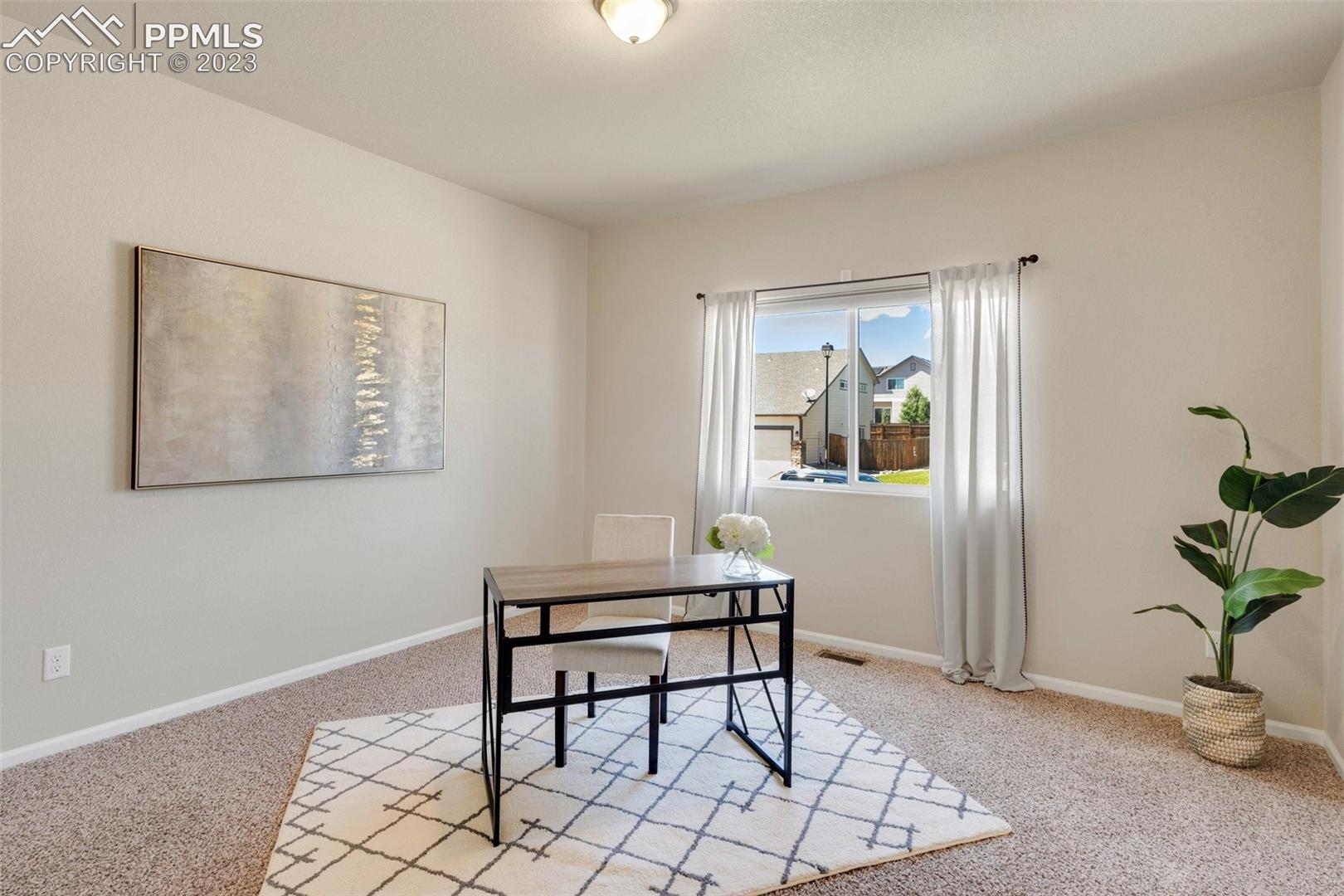 7040 Red Cardinal Loop Colorado Springs, CO 80908 - Photo 13 of 28 Main Level Bedroom #2/Office