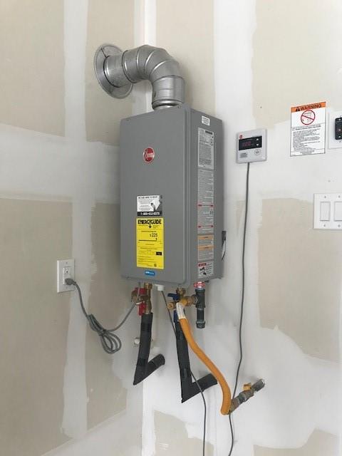 8089 Rabbit Drive Frisco, TX 75034 - Photo 8 of 37 Utilities featuring tankless water heater