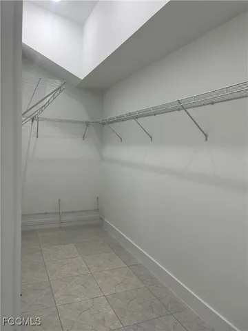 a view of an empty walk in closet