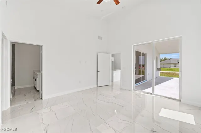 a view of an entryway with wooden floor
