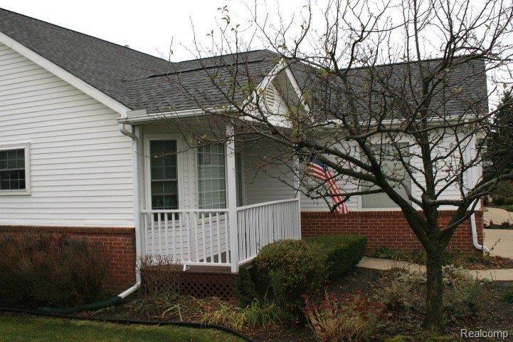 1124 Curzon Street, Unit 13 Howell, MI 48843 - Photo 2 of 12 Front porch