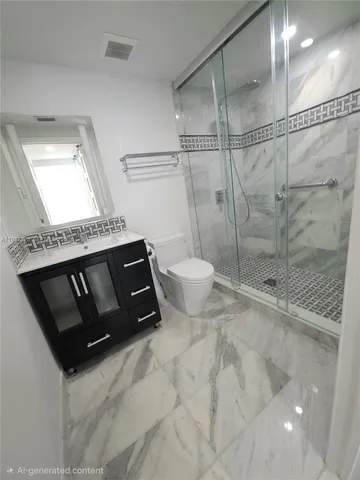 a view of an empty room with a chandelier fan