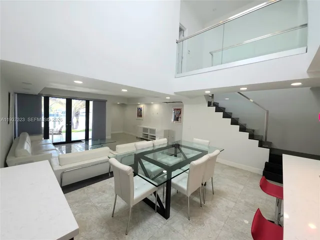 a living room with furniture and a couch