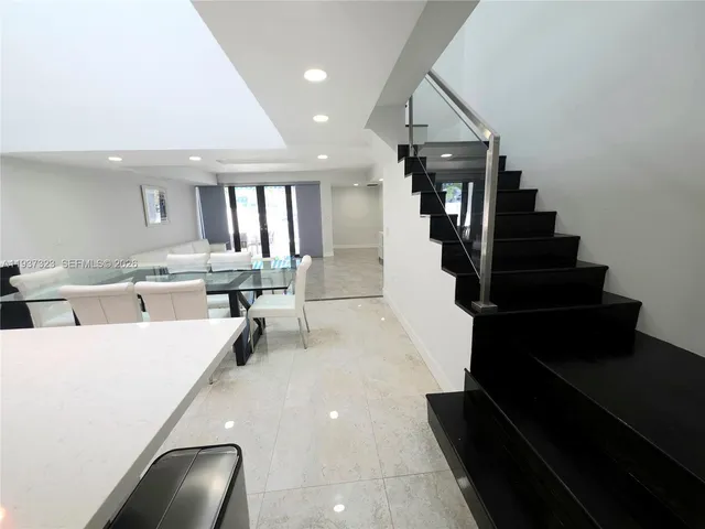 a view of an entryway with furniture