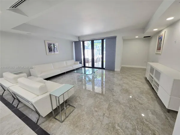 a view of an entryway with furniture