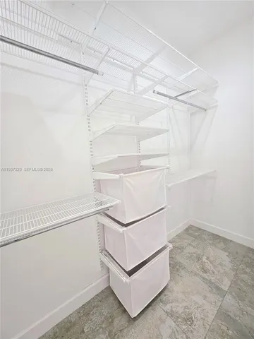 a view of entryway and kitchen