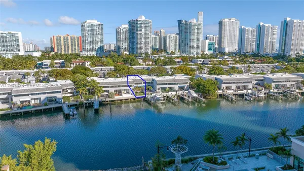 a view of a city with tall buildings