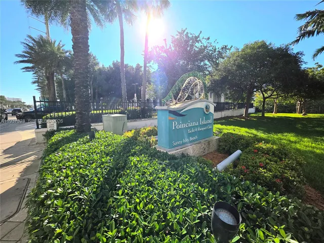 a view of a garden with sitting area