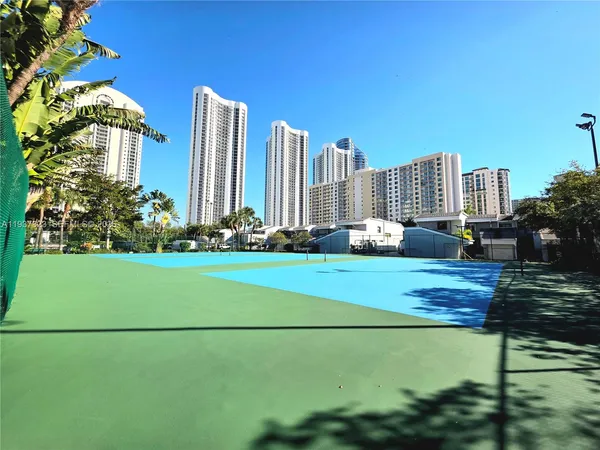 a view of a city with tall buildings