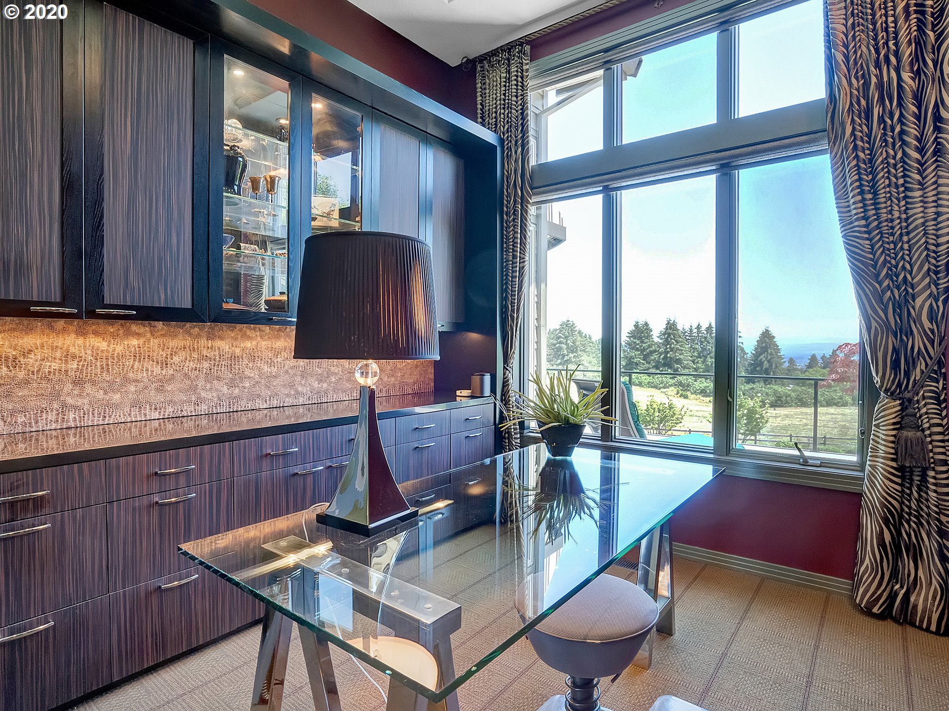 27019 Southwest Ladd Hill Road Sherwood, OR 97140 - Photo 13 of 32 a living room with furniture and a floor to ceiling window