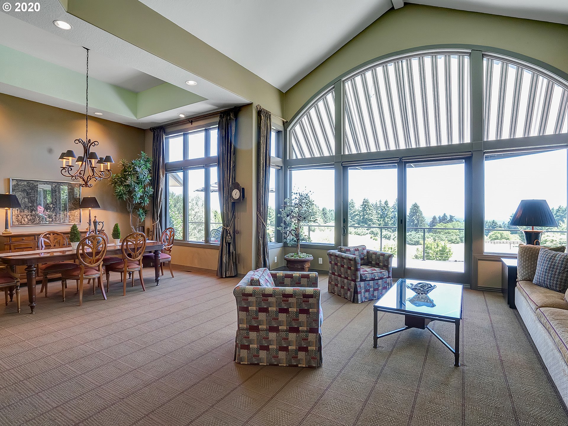 27019 Southwest Ladd Hill Road Sherwood, OR 97140 - Photo 3 of 32 a living room with furniture and floor to ceiling window