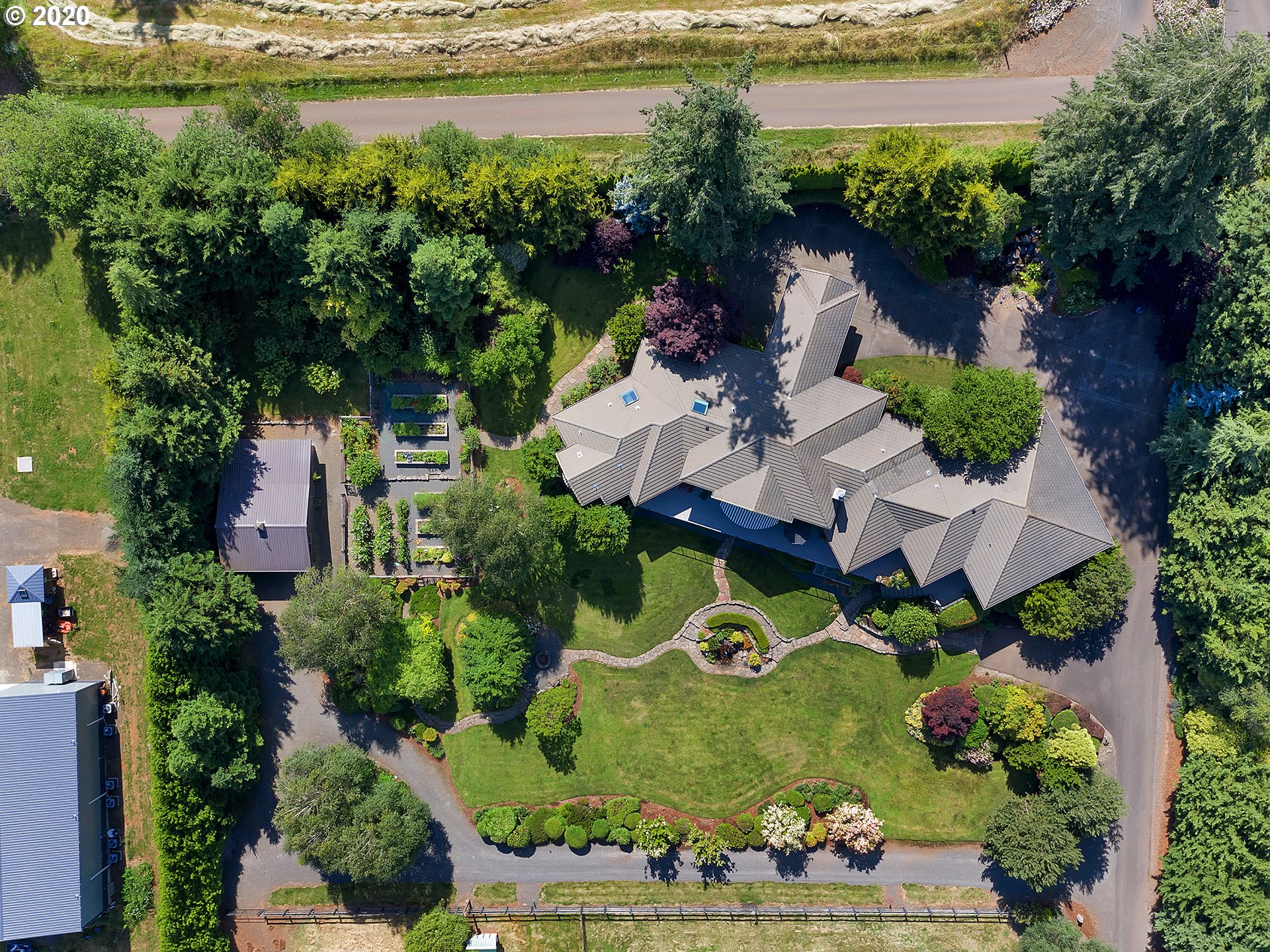 27019 Southwest Ladd Hill Road Sherwood, OR 97140 - Photo 32 of 32 an aerial view of residential house with outdoor space and lake view