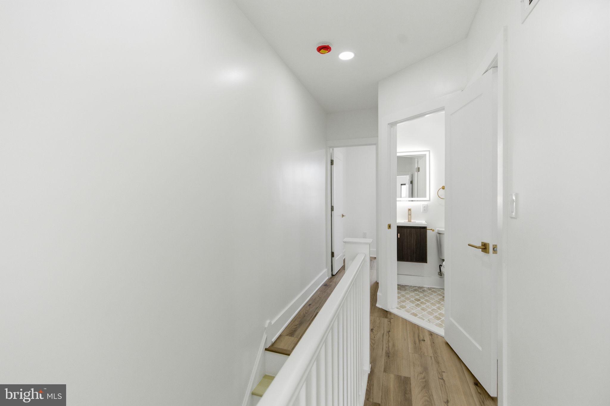 4662 James Street Philadelphia, PA 19137 - Photo 22 of 32 a view of a hallway with a white walls