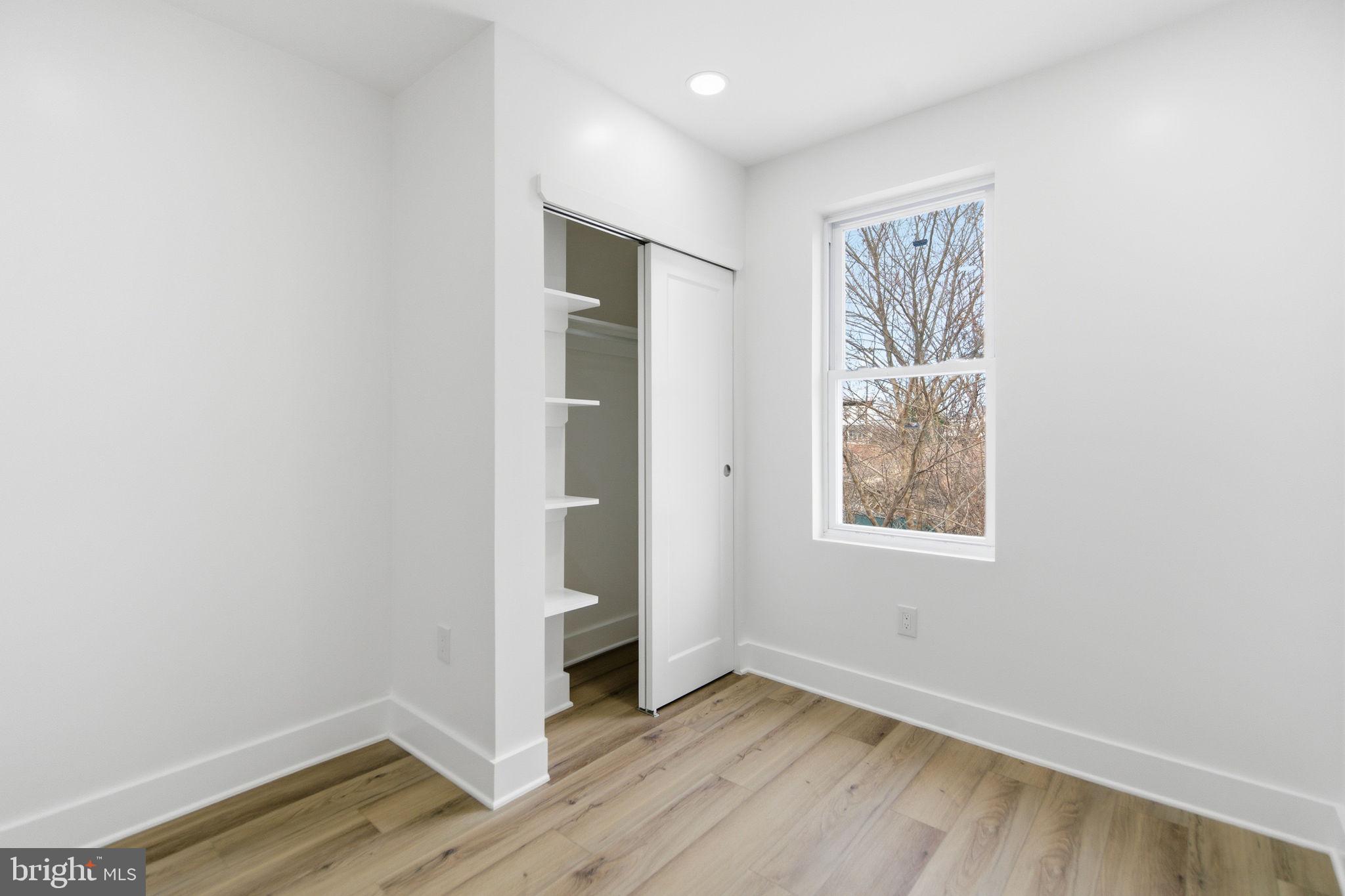 4662 James Street Philadelphia, PA 19137 - Photo 24 of 32 an empty room with windows and closet