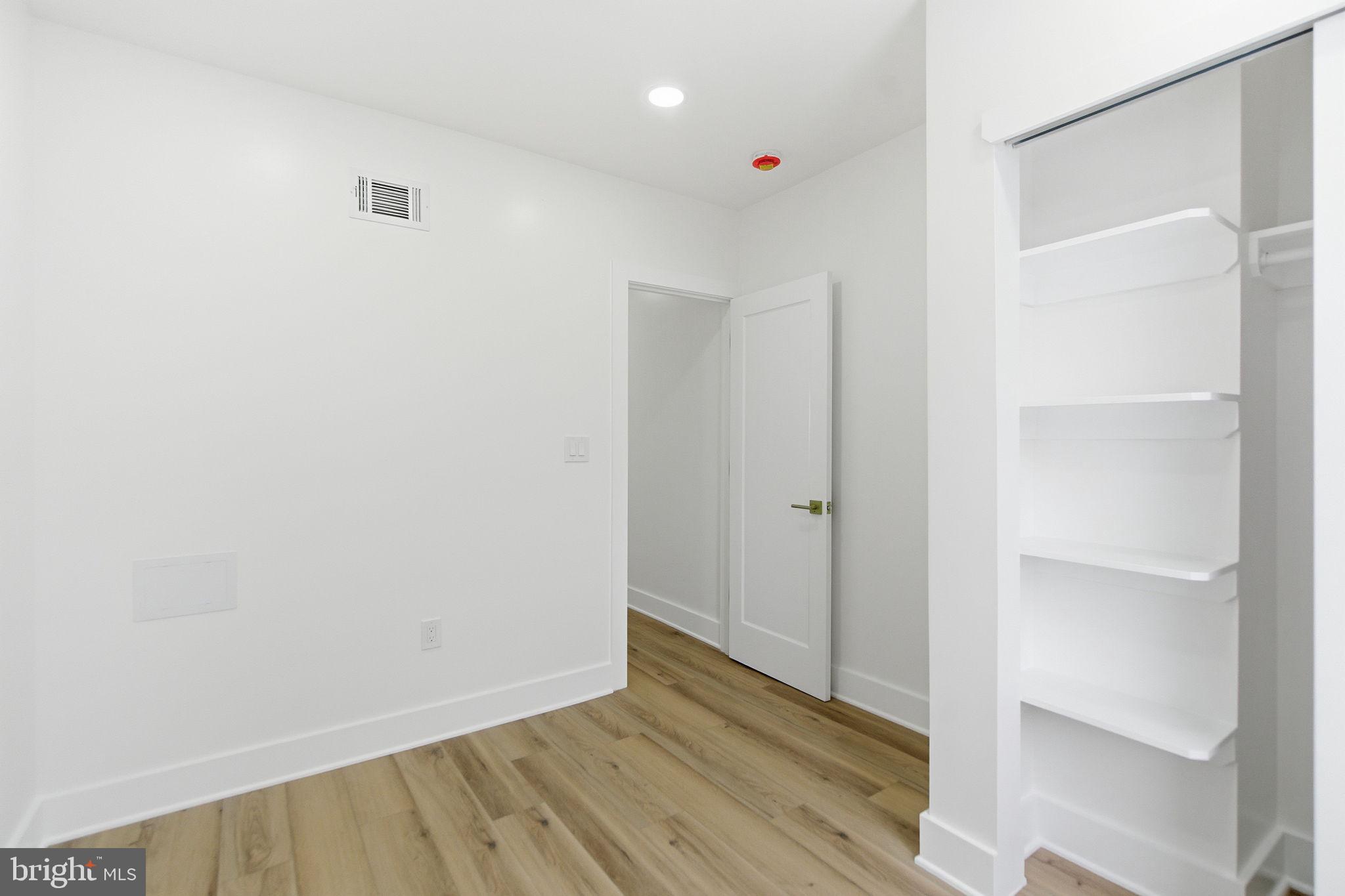 4662 James Street Philadelphia, PA 19137 - Photo 25 of 32 a view of an empty room with wooden floor